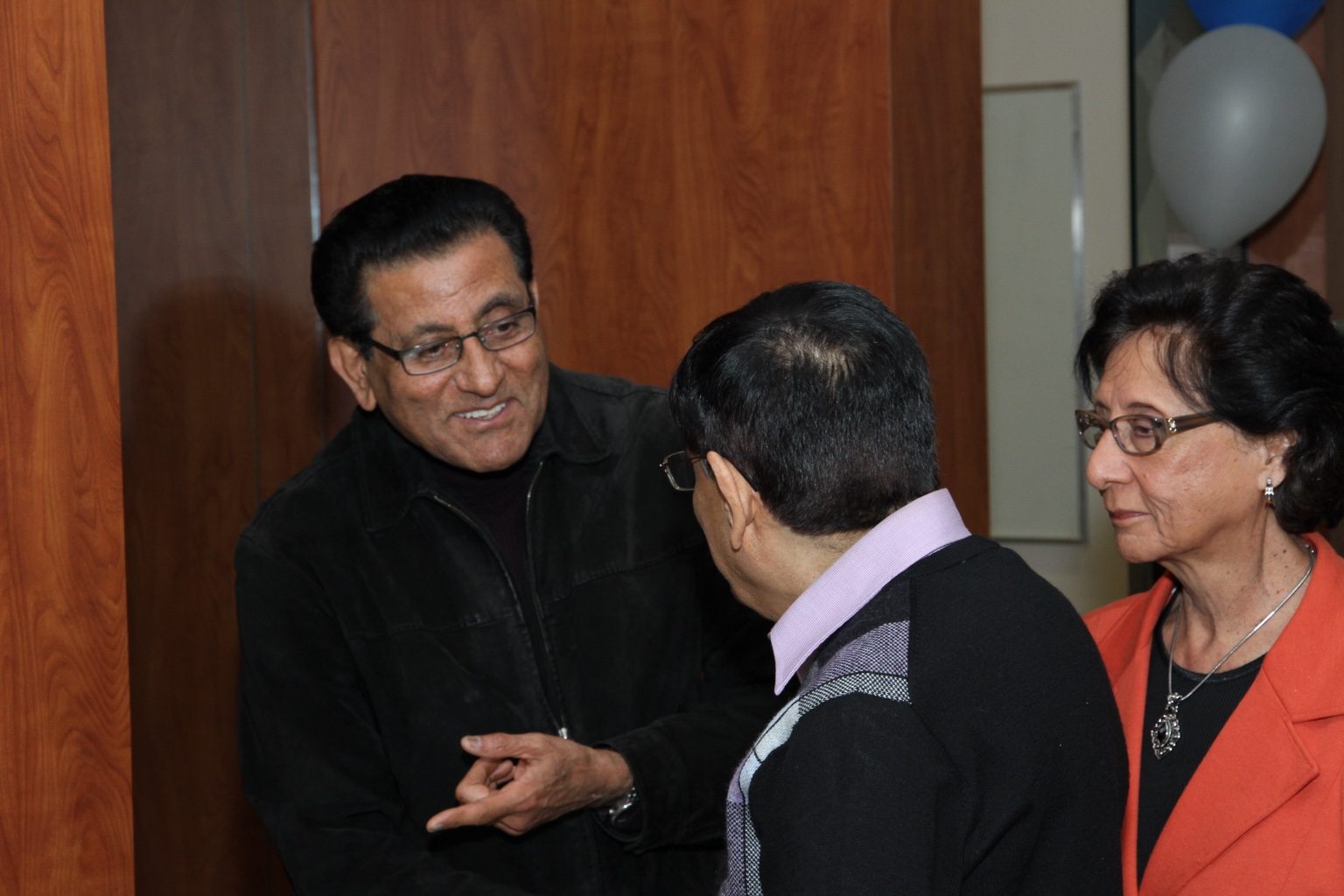 Guests in conversation during the 2011 dedication reception