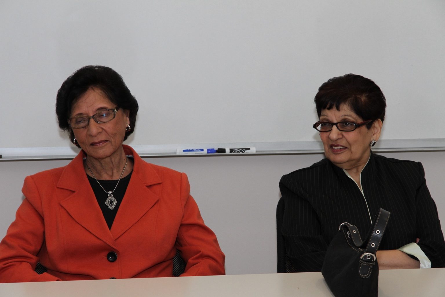 Two guests seated during the 2011 dedication gathering