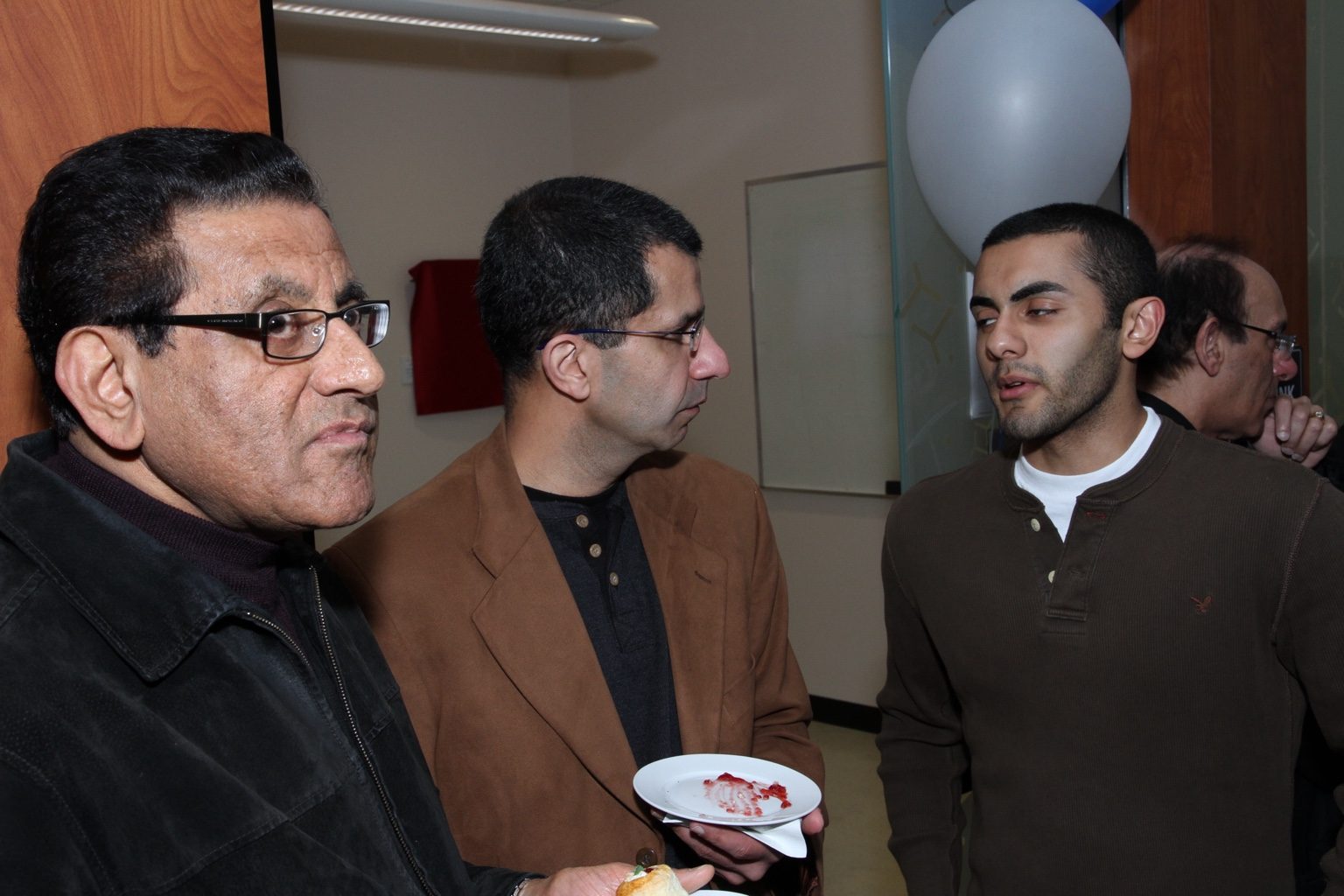 Guests in conversation at the 2011 dedication reception