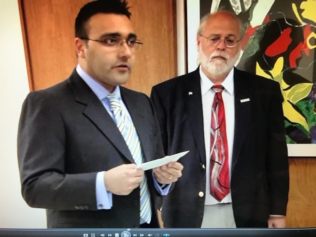 Archival video still showing remarks during the Kanani Conference Rooms dedication
